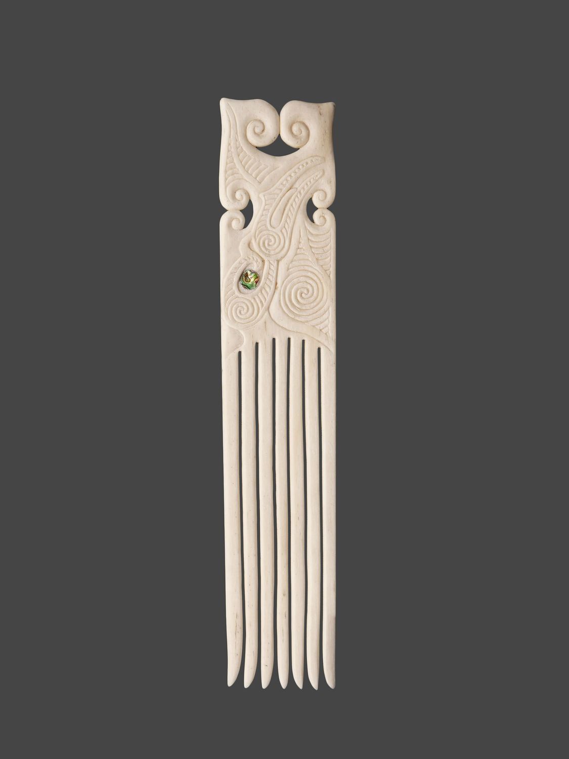 Moko Pounamu Heru Genuine Whale Bone Carving - Tarata Moko Pounamu Heru Genuine Whale Bone Carving - Tarata