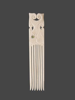 Moko Pounamu Heru Genuine Whale Bone Carving - Tarata Moko Pounamu Heru Genuine Whale Bone Carving - Tarata