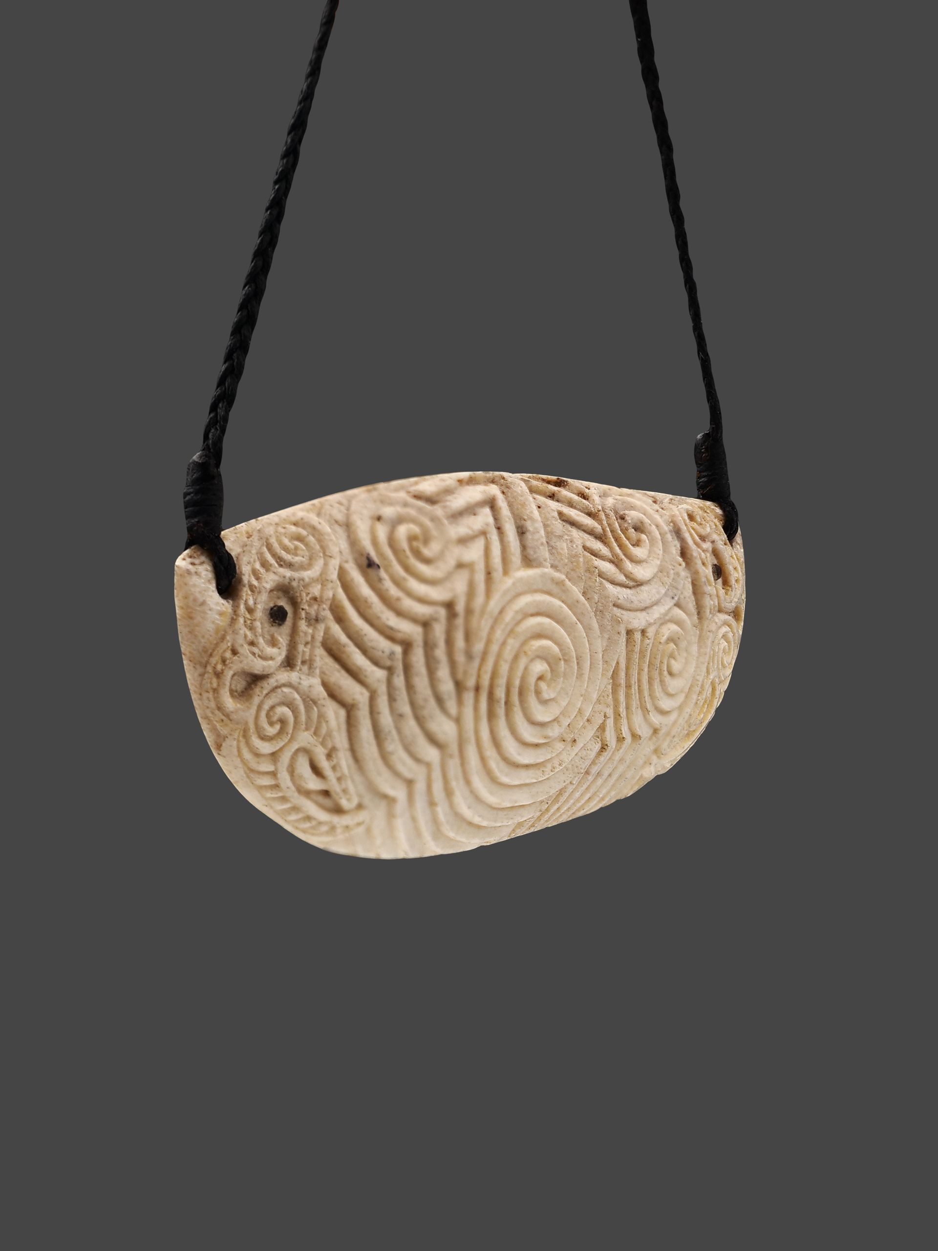 Moko Pounamu 'Ocean Currents' Genuine Whale Bone Carving - Tahuaroa