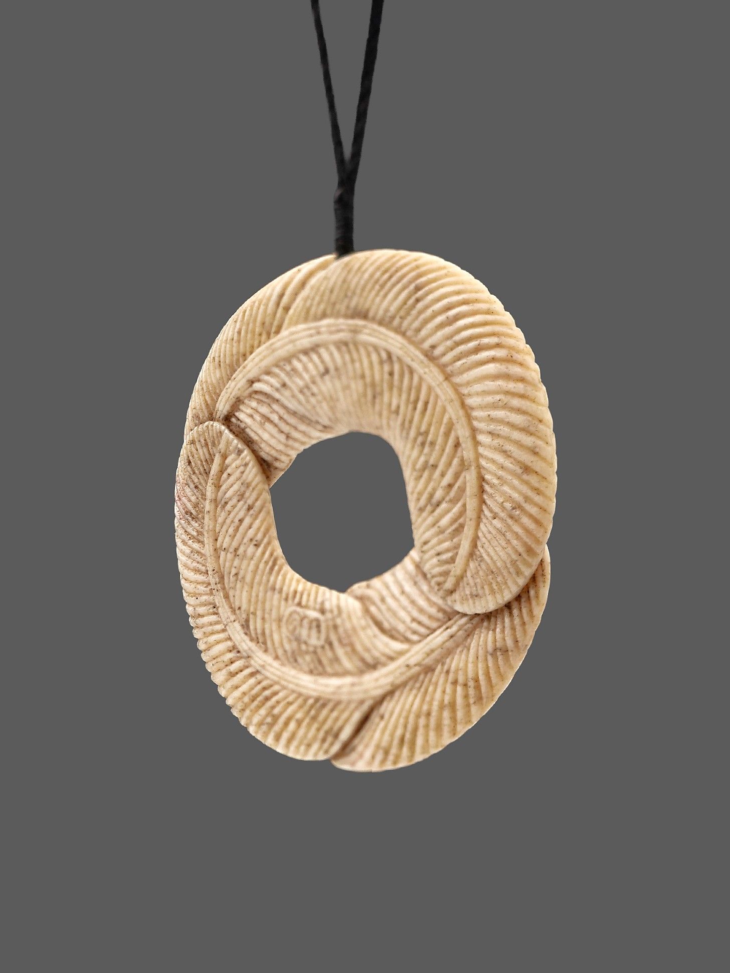 Moko Pounamu Huru (Feather) Genuine Whale Bone Carving - Karekare