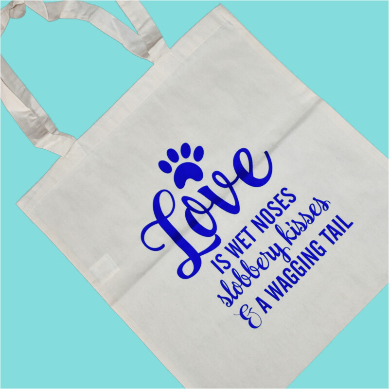 Love is wet noses, slobbery kisses and a wagging tail -Tote