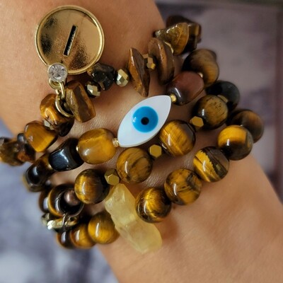 Tiger Eye bracelet set of 4. Made with different shaped  beads for good luck and repel bad energy.