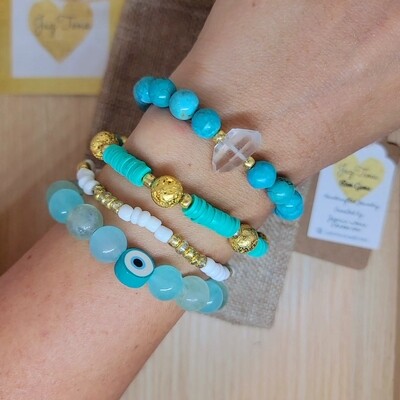 Turquoise Stack. Aquamarine, turquoise, and gold lava beaded bracelets for women 