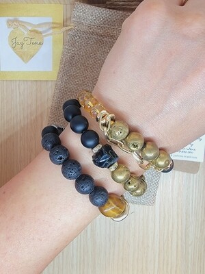Black and Gold Onyx Stack. Raw onyx, tiger eye, agates, lava, and hematite beaded bracelets 