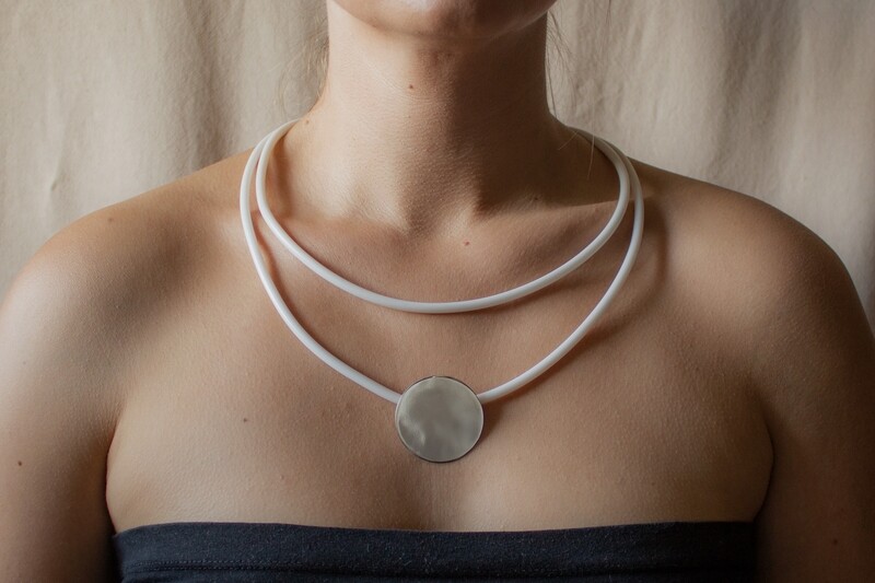 Modern necklace made of silver and caoutchouc