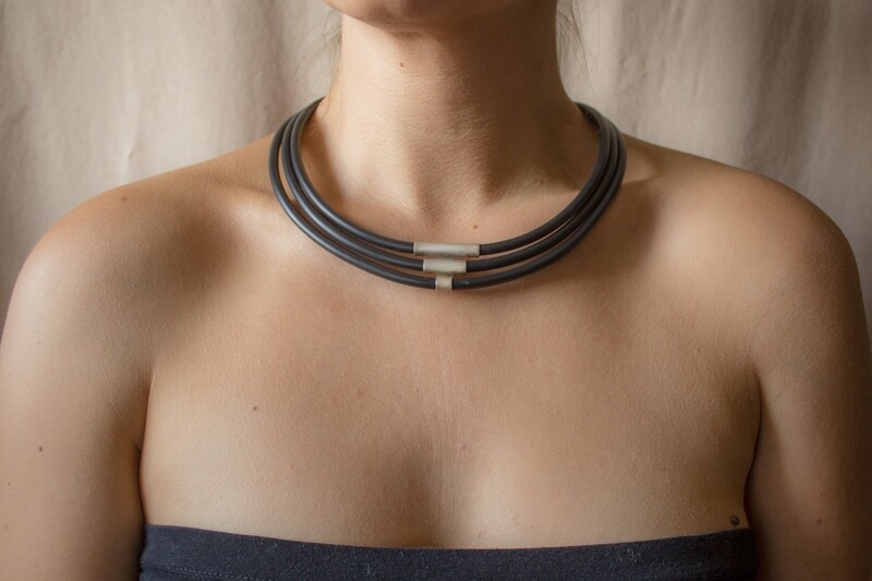 Modern necklace made of silver and caoutchouc