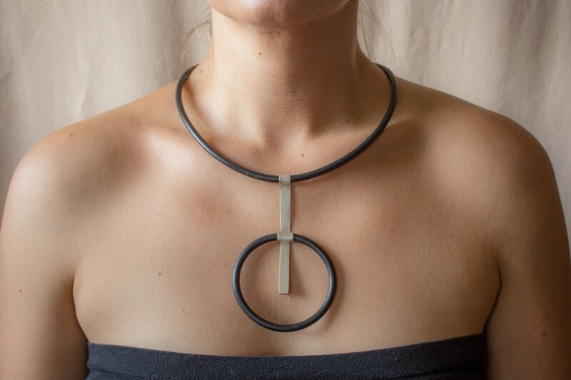Modern necklace made of silver and caoutchouc