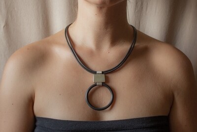 Modern necklace made of silver and caoutchouc