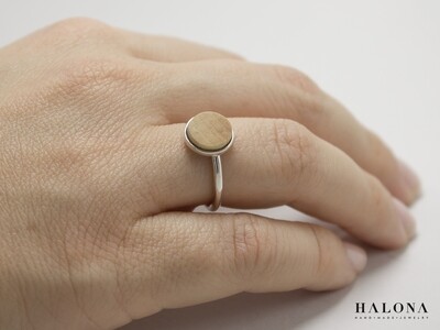 Handmade modern circle silver and wood ring.