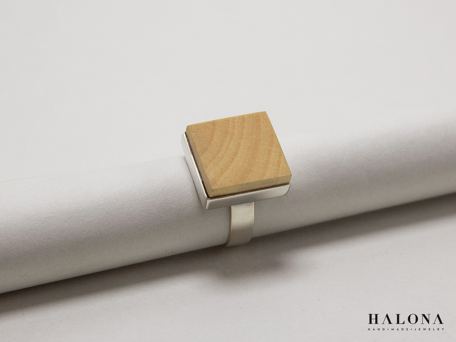 Handmade modern silver and wood ring.