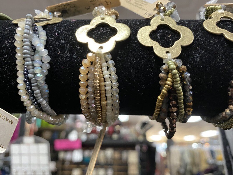 Bracelet-stretchy Beaded Multi Strand With Gold Center Piece In Multiple Colors