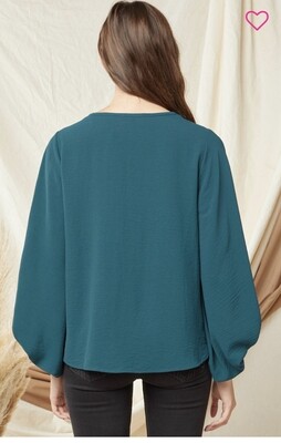 Shirt-Ruby and Teal (solid color) v-neck with bubble sleeves. 100% polyester