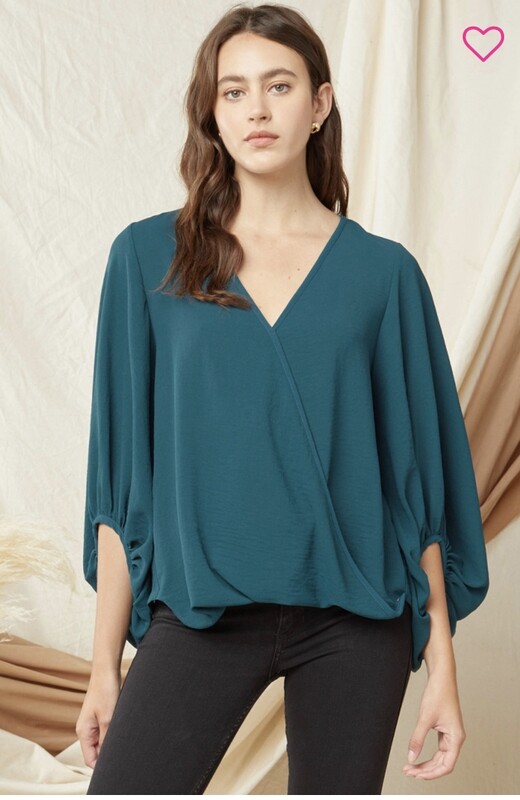 Shirt-Ruby and Teal (solid color) v-neck with bubble sleeves. 100% polyester