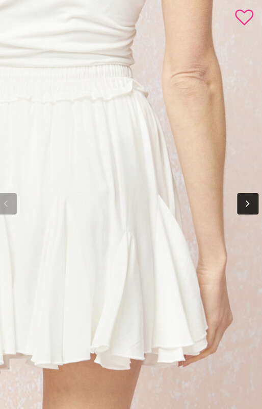 Skirt-Off White solid Godet Skirt With Tie Waist And Lined With Shorts. Non Sheer, Lightweight. 80% Rayon 20% Polyester Model Is 5’9 Wearing A Small