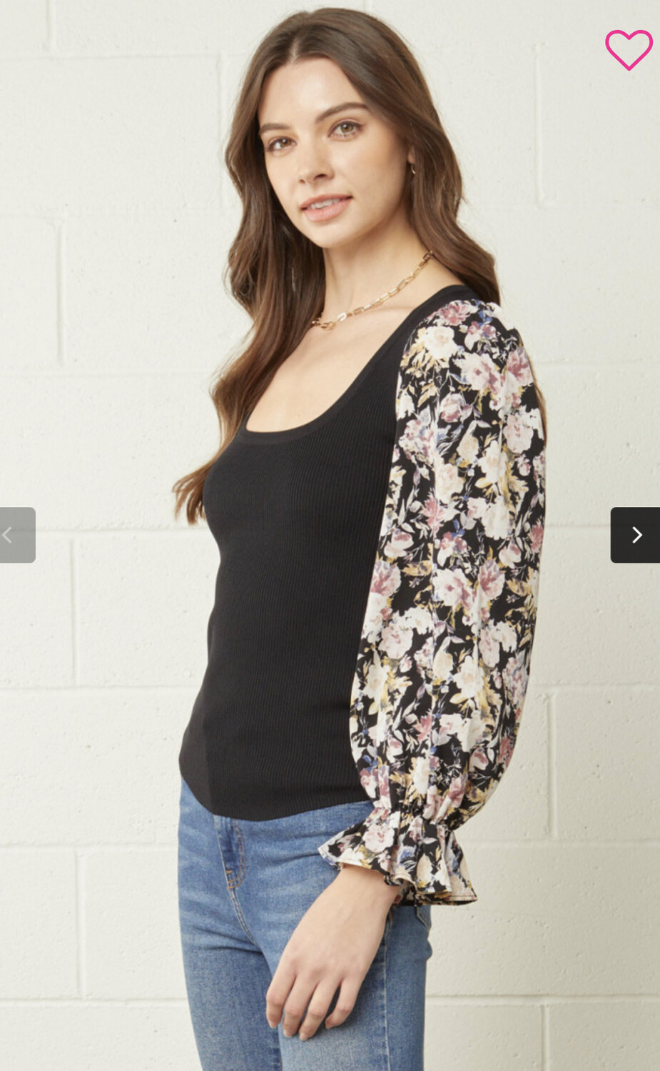Shirt-Black Solid Bodice With Scoop Neckline And Sheer Floral Sleeves With Light Elastic Gathering At Wrist.  65% Viscose 35% Nylon. Model Is 5’10 Wearing A Small