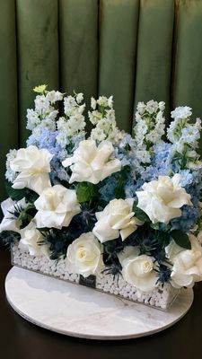 Blue delphinium with stone