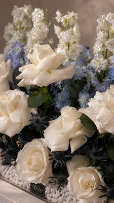 Blue delphinium with stone