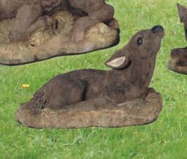 RECLINING FAWN LOOKING UP