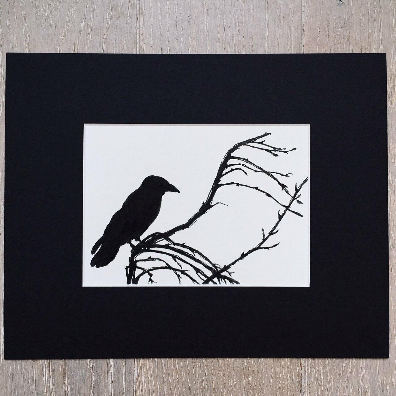 Corbeau sur branche