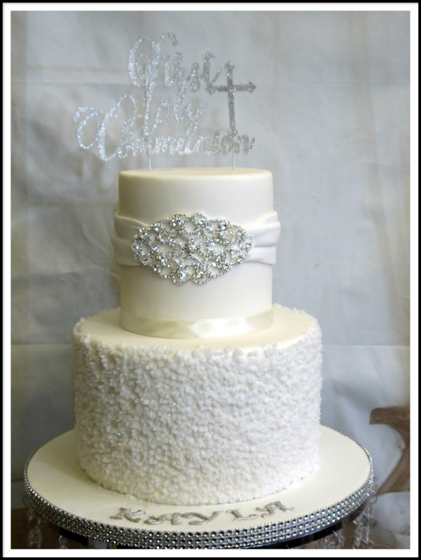 2 tier communion cake with dimante detail and glitter topper