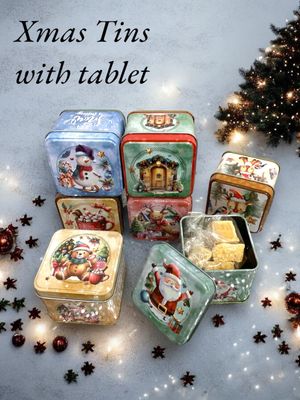 Christmas tins with tablet