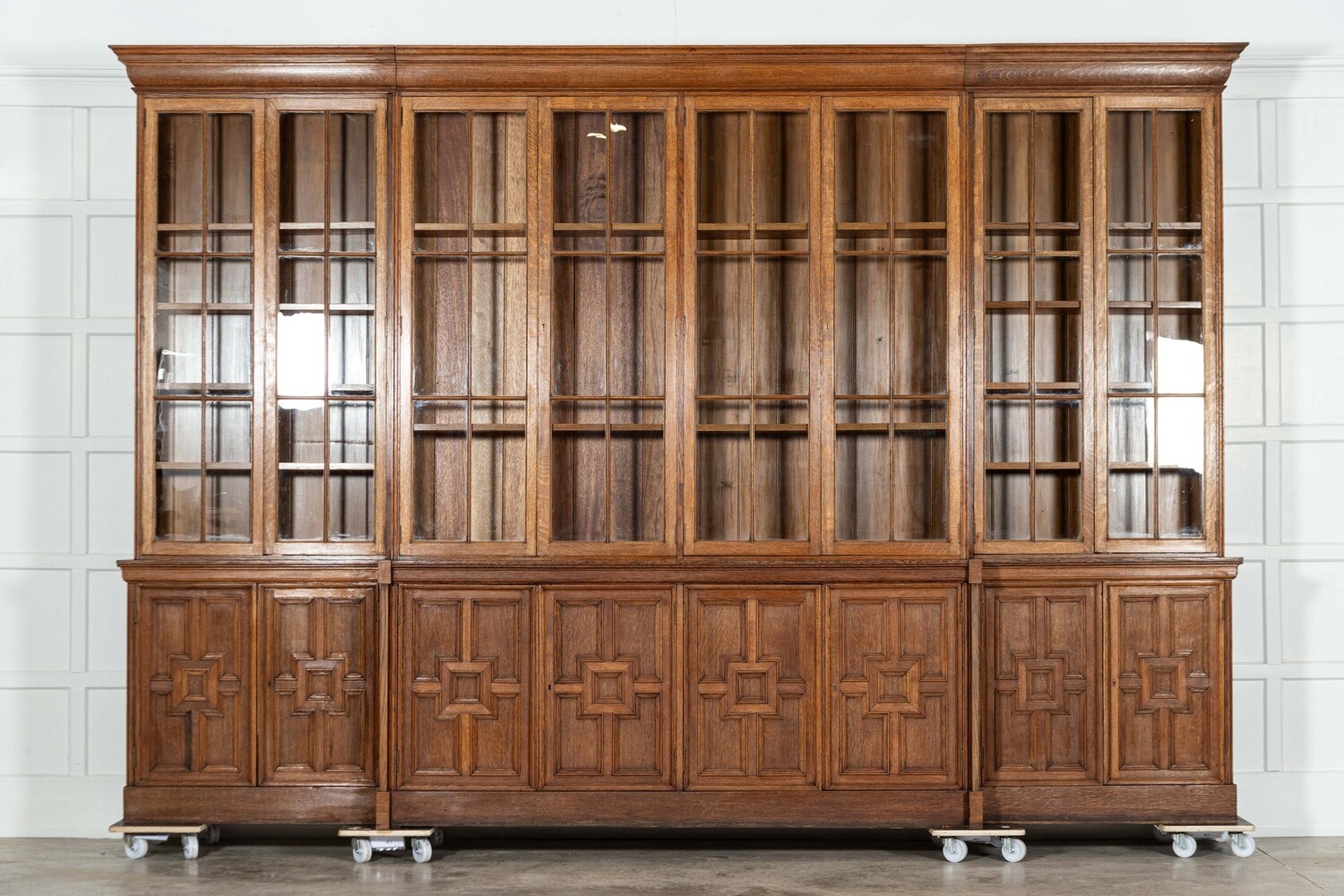 Monumental English Oak Glazed Breakfront Bookcase Cabinets
