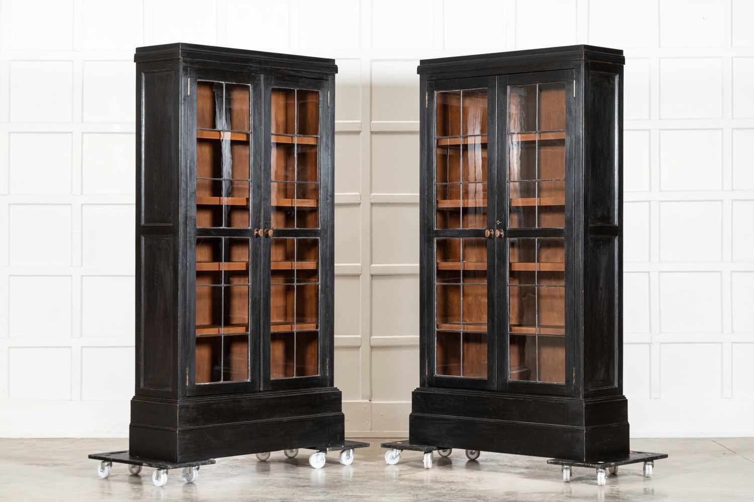 Pair English Ebonised Oak Glazed Bookcases