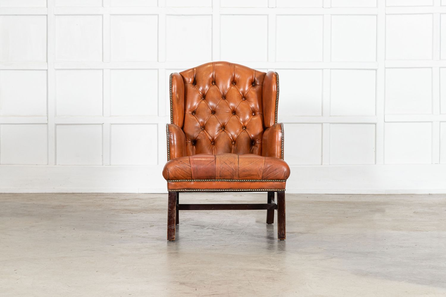English Tan Leather Wingback Armchair English Tan Leather Wingback Armchair