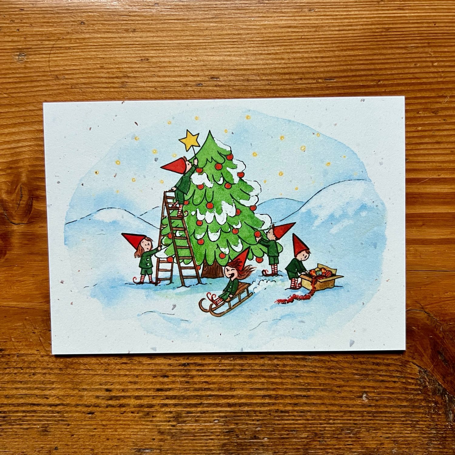 Carte traditionnelle A6 « Les lutins préparent le sapin de Noël »