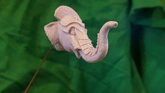 EH03 Armoured head 1 with trunk raised.