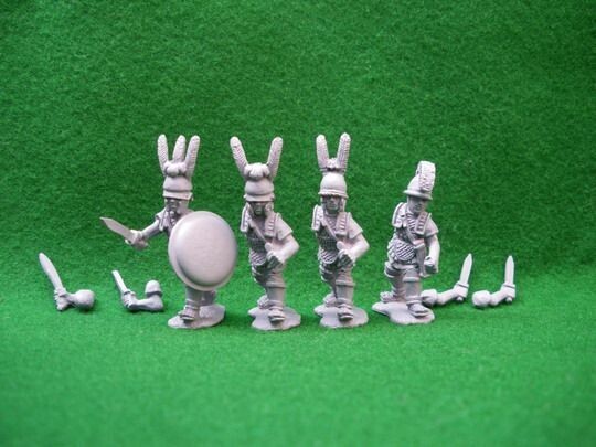 ETR07c Late Etruscan advancing with sword/axe