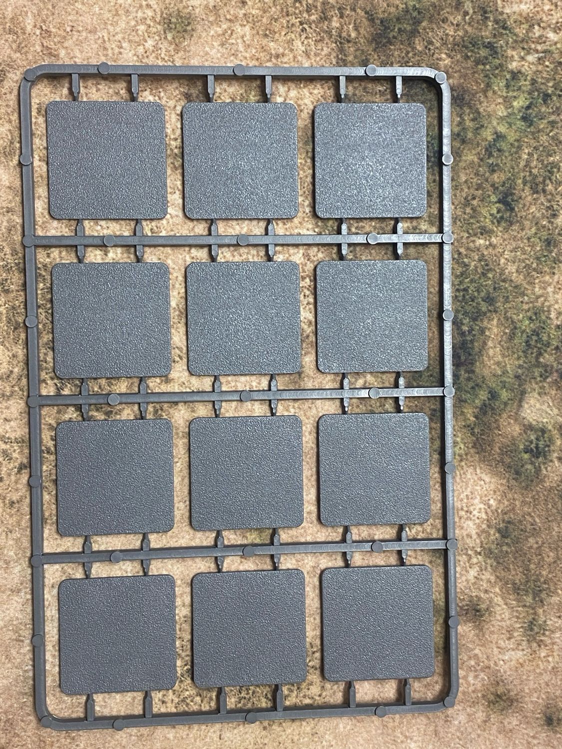 Single Sprue from Plastic Base Set 2, 40mm x 40mm. 12 bases per sprue.