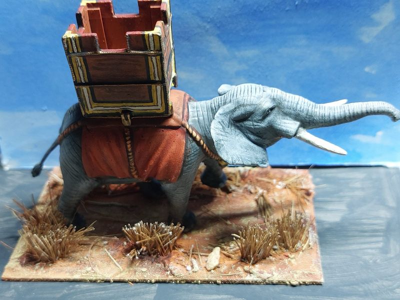 ELA02 African Elephant with howdah, trunk raised