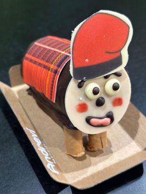 Mini tió de nata banyat xocolata