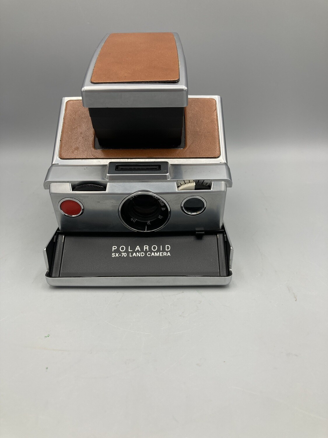 Polaroid SX-70 Black or Brown