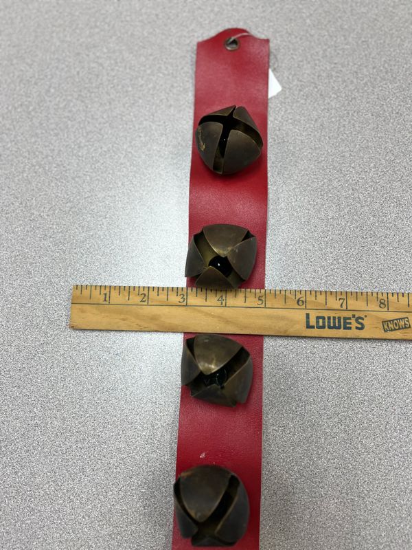 4 brass jingle bells with strap