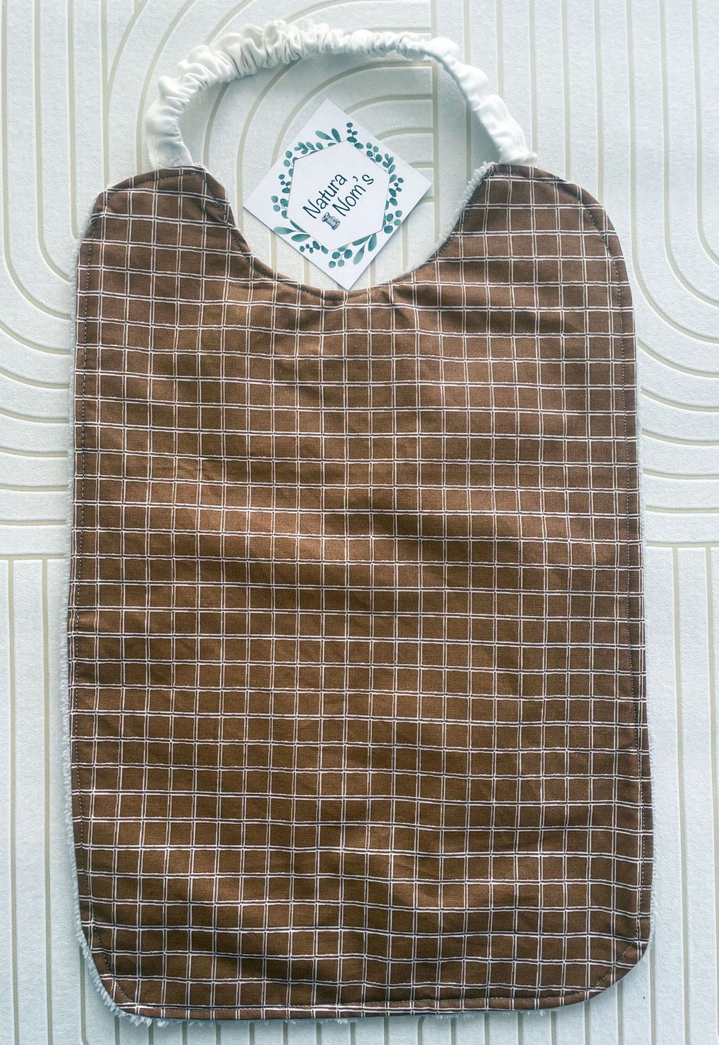 Bavoir élastique enduit - Rayures marron