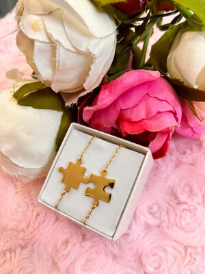 Coppia di bracciali Puzzle dorati