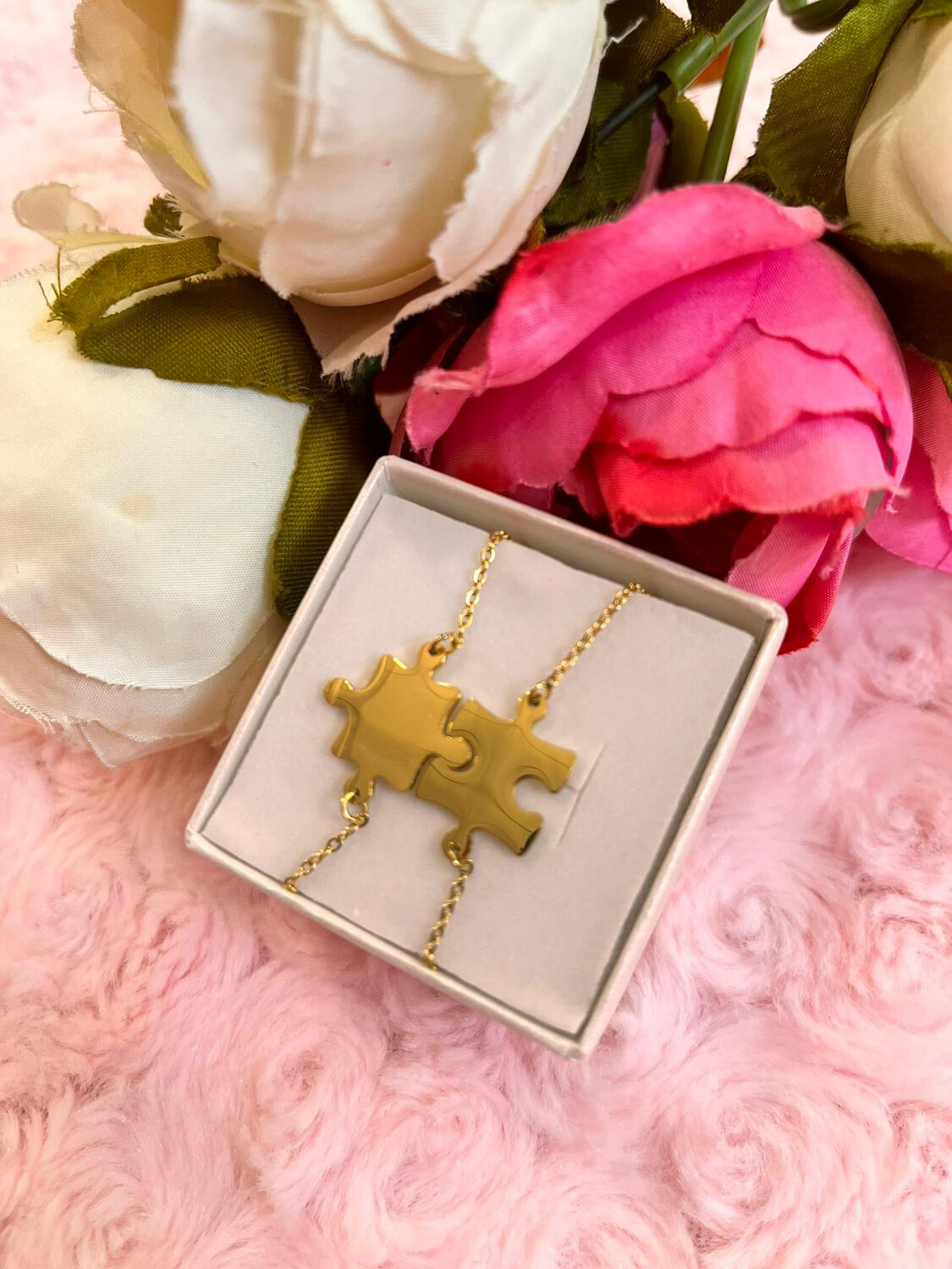 Coppia di bracciali Puzzle dorati