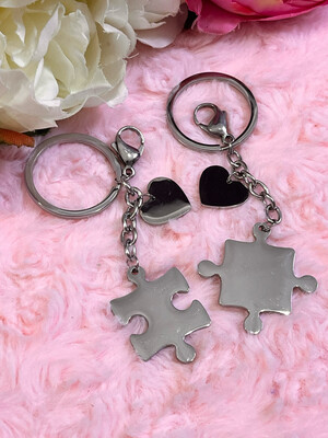 Coppia portachiavi Puzzle argentati