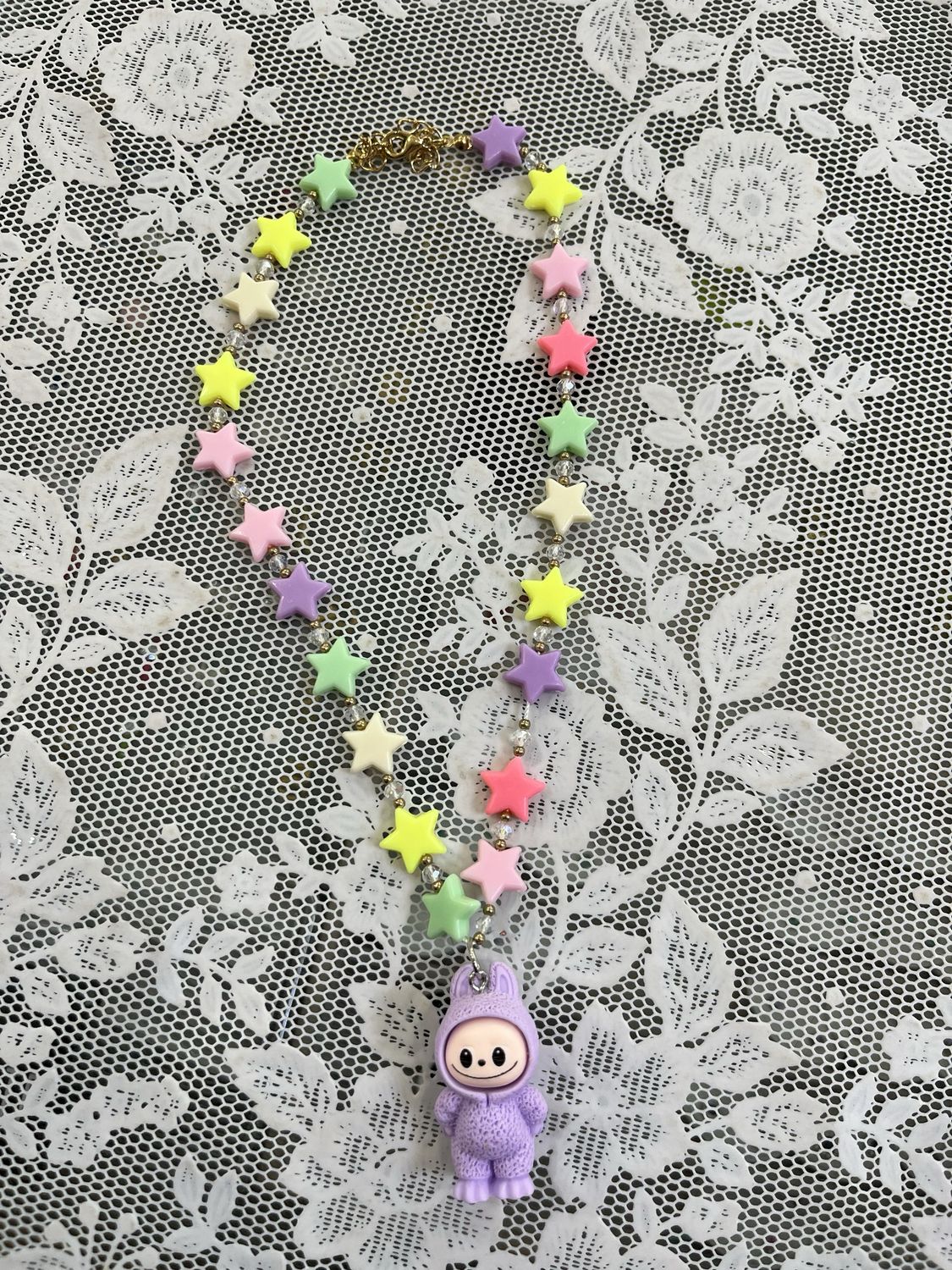 Collana corta stelline mostriciattolo lilla
