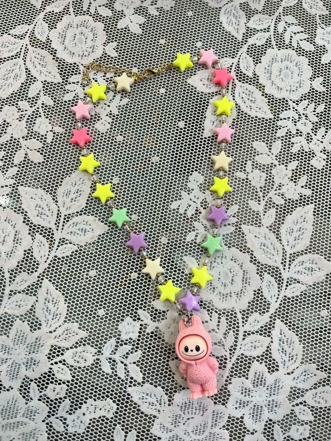 Collana corta stelline mostriciattolo rosa