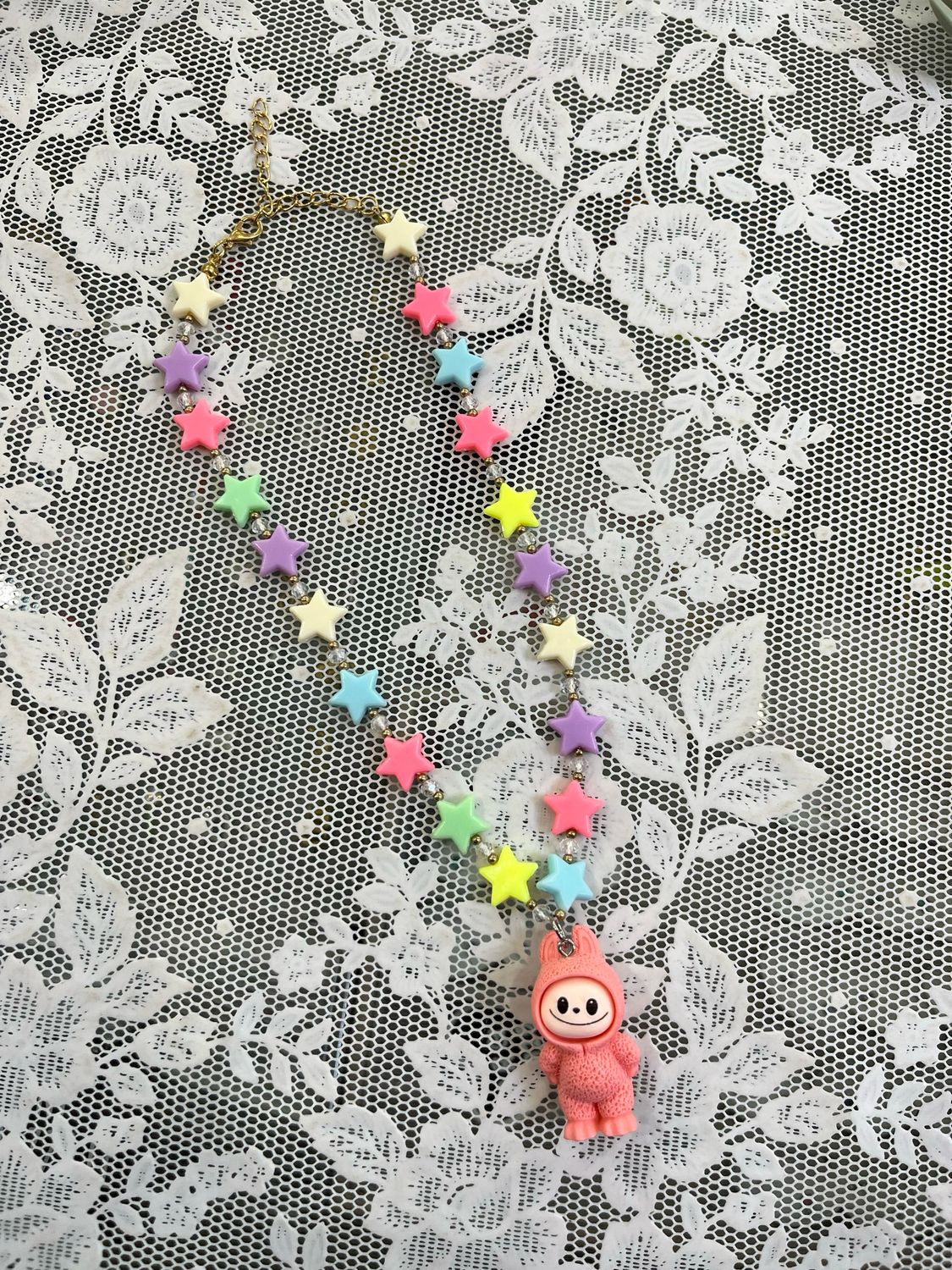 Collana corta stelline mostriciattolo corallo