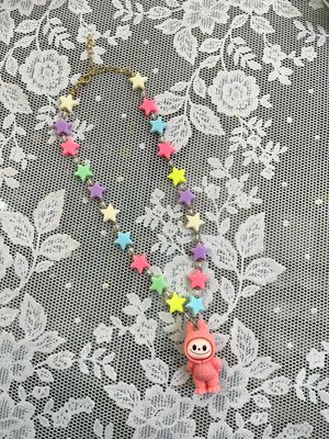 Collana corta stelline mostriciattolo corallo