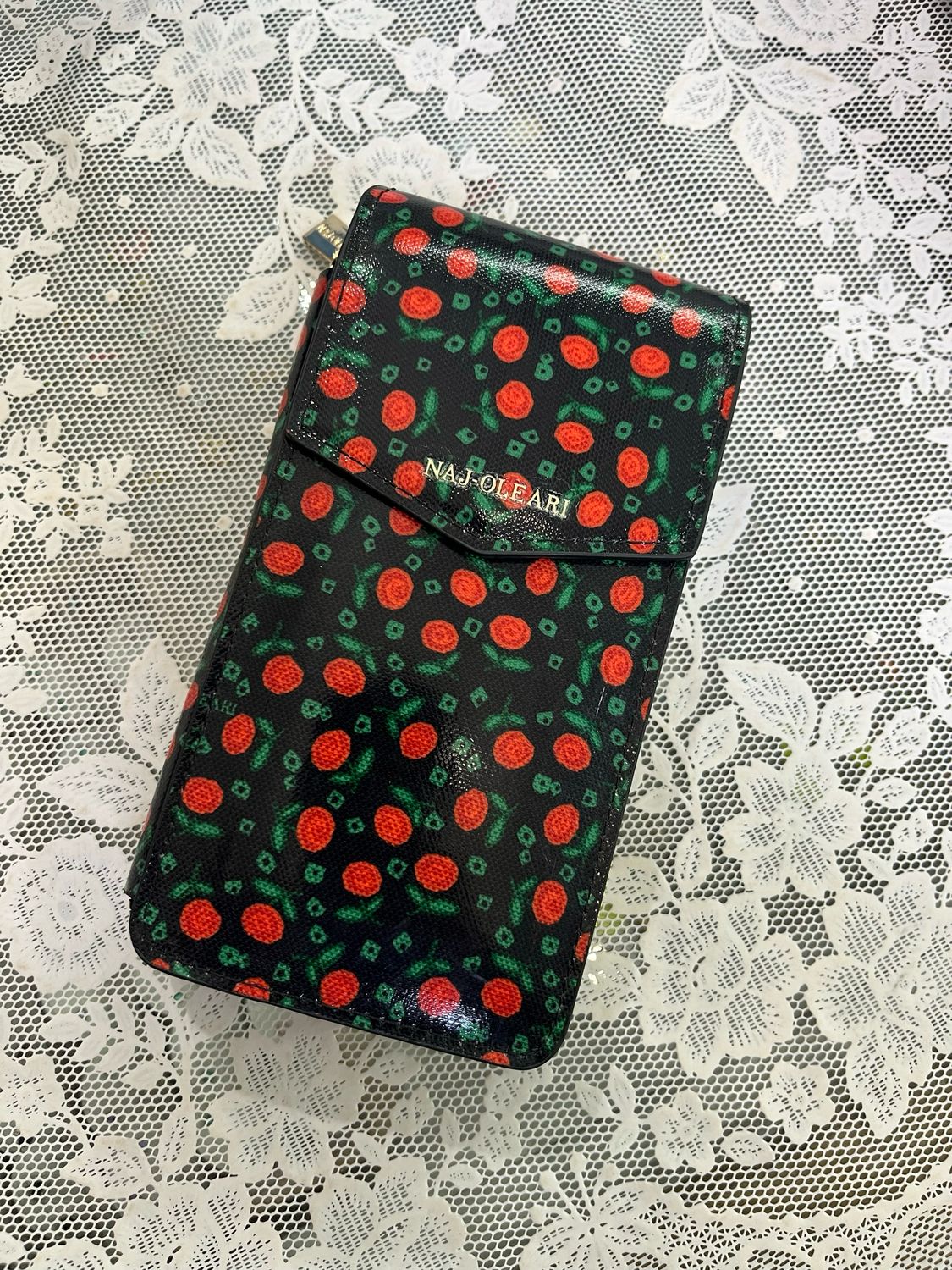 Porta cellulare con tracolla boccioli fondo nero Naj-Oleari