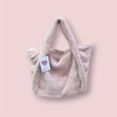 Borsa in ecopelliccia rosa con tracolla