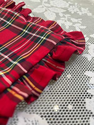 Beauty pochette tartan con ruches