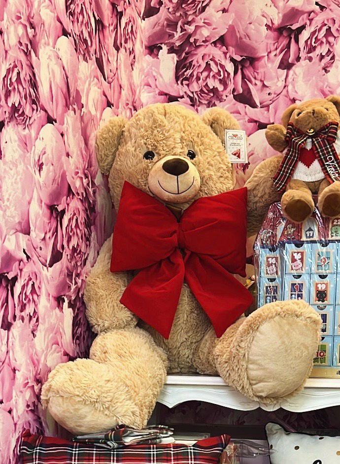 Orso gigante peluche con fiocco