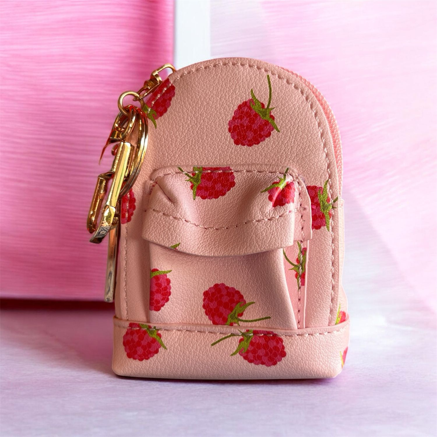 Portachiavi Naj-Oleari zainetto lamponi fondo rosa