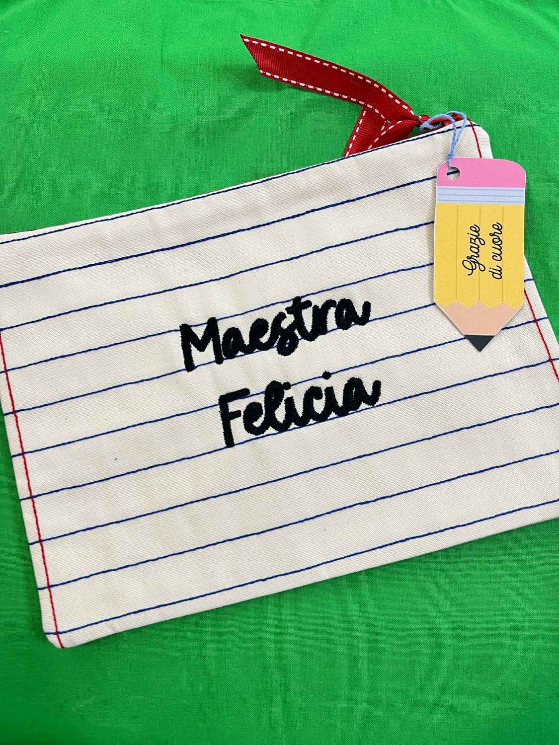 Pochette personalizzata ricamata tema Maestra